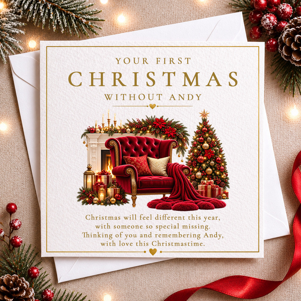 Personalised first Christmas without you memorial card featuring a red velvet chair, festive Christmas tree and fireplace, with the name Andy and remembrance message.