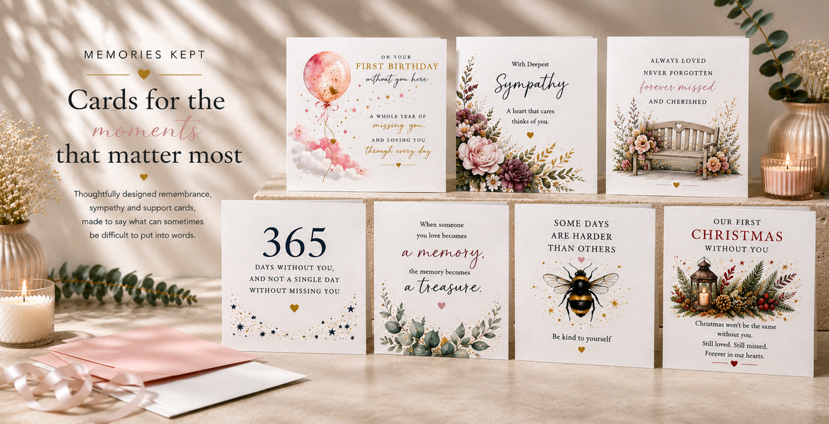 A set of floral and illustrated greeting cards arranged on a tabletop with candles, greenery, and warm decor. The cards feature sentimental messages such as 'Cards for the memories that matter most,' '365 days to love and cherish you,' 'a memory, a treasure,' 'SOME DAYS ARE GARDEN THAN OTHERS,' 'Our First Christmas Without You,' and 'Sympathy.