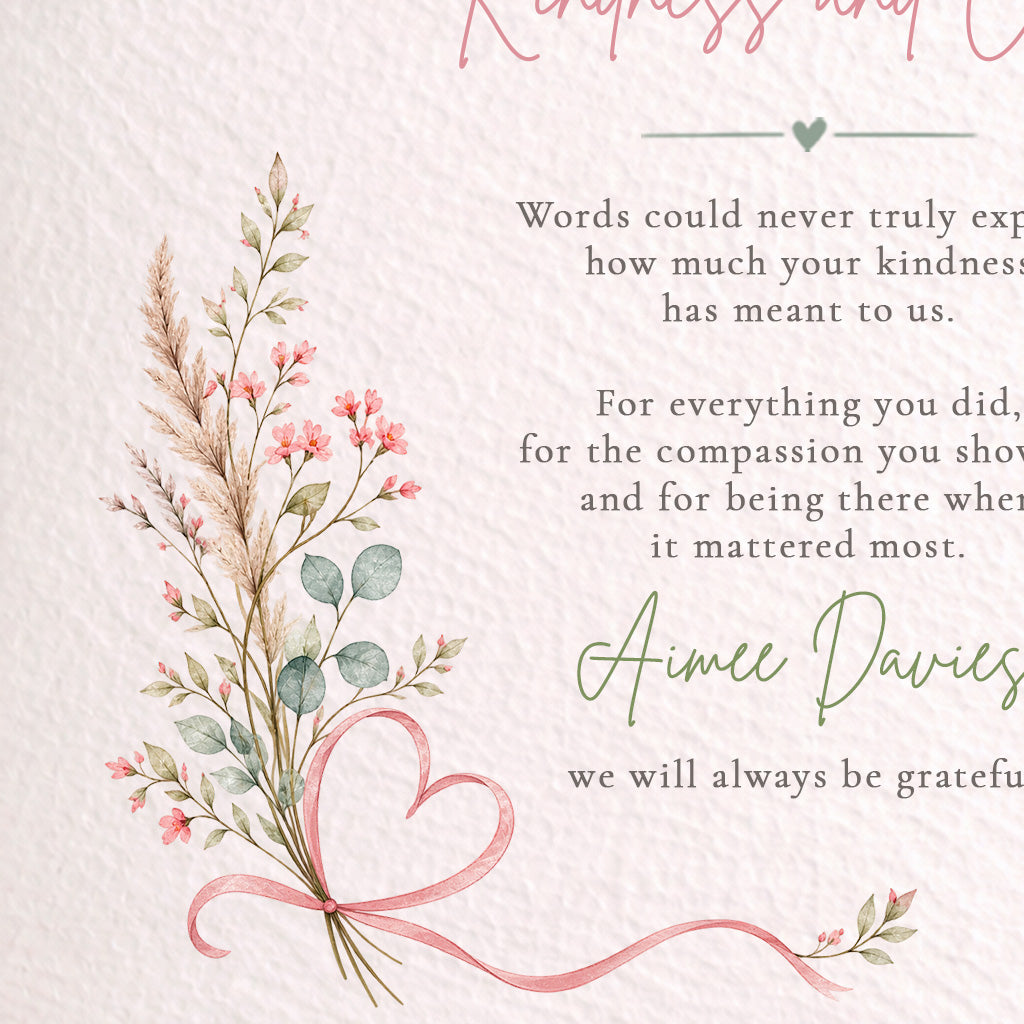 A square memorial card design with a textured off-white background, featuring a watercolor bouquet of pink flowers, green leaves, and a pink ribbon tied into a heart shape. The right side contains a printed remembrance quote in black serif text with 'Aimee Davies' in green script.